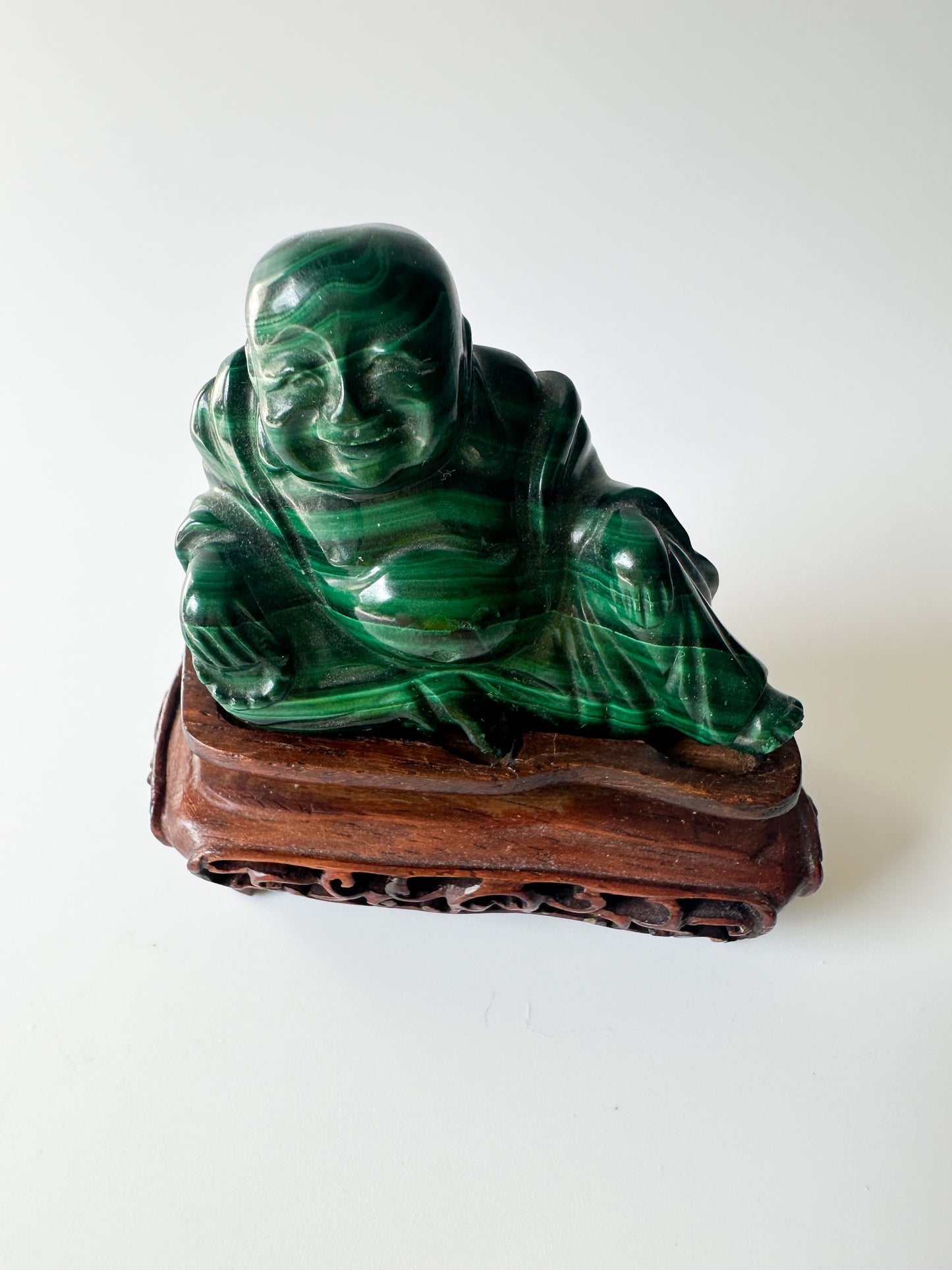 Genuine Malachite Buddha with Wood Stand (2.125"L x 1"W x 1.75"H)