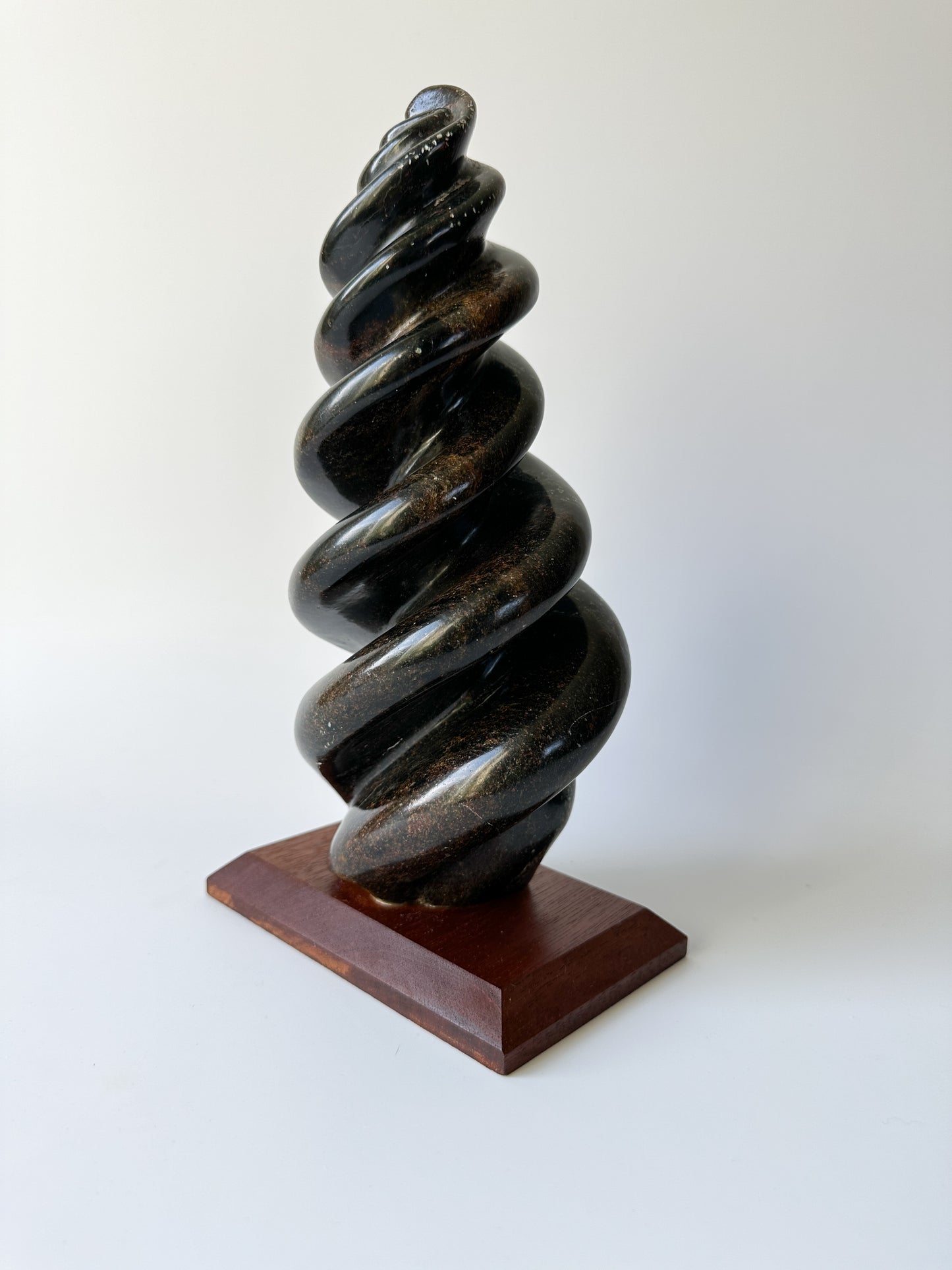 Hand Carved Stone Sculpture on Wood Base