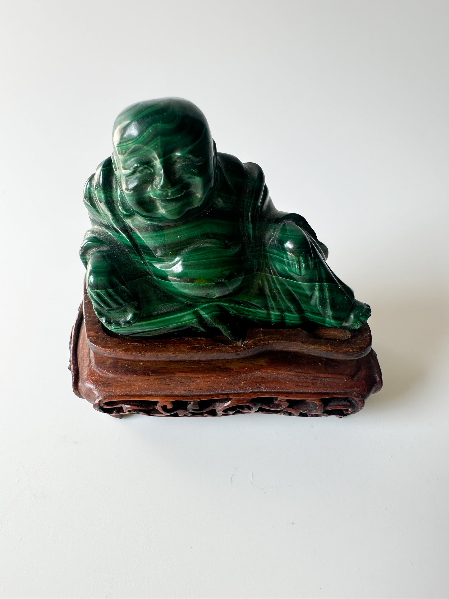 Genuine Malachite Buddha with Wood Stand (2.125"L x 1"W x 1.75"H)