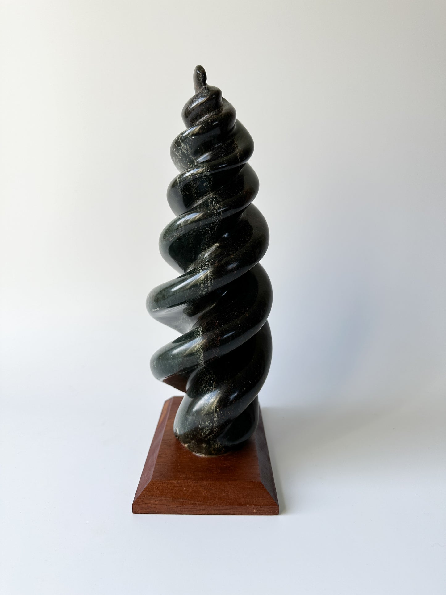 Hand Carved Stone Sculpture on Wood Base