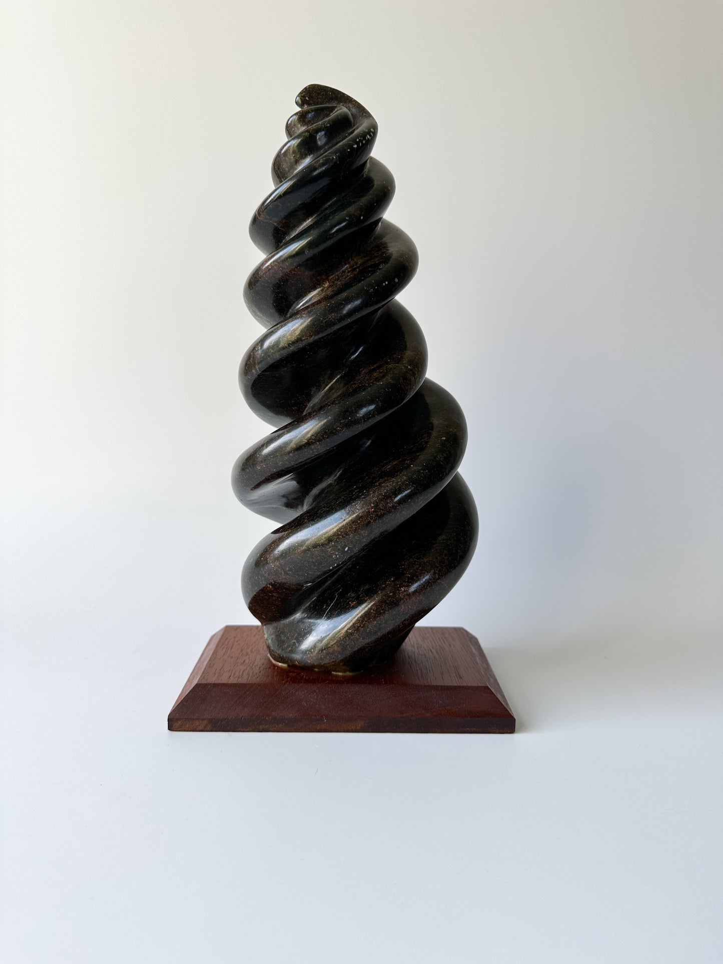 Hand Carved Stone Sculpture on Wood Base