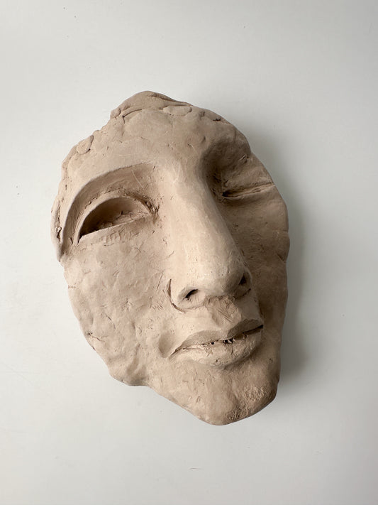 Clay Face Sculpture