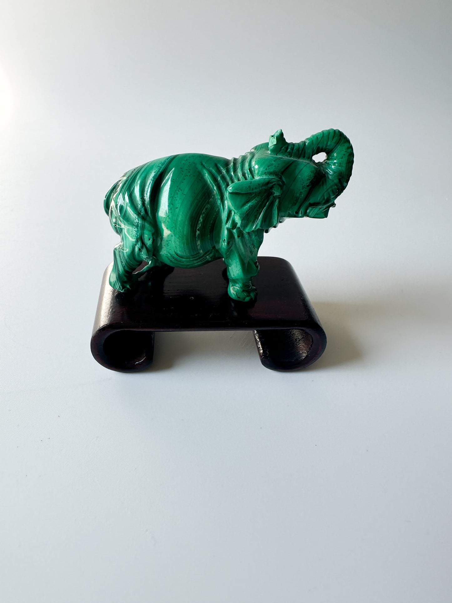 Genuine Malachite Elephant with Wood Stand (2.3125"L x 1"W x 1.75"H)