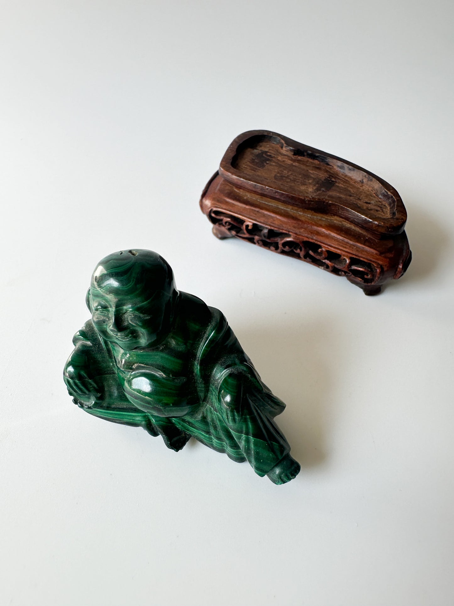 Genuine Malachite Buddha with Wood Stand (2.125"L x 1"W x 1.75"H)