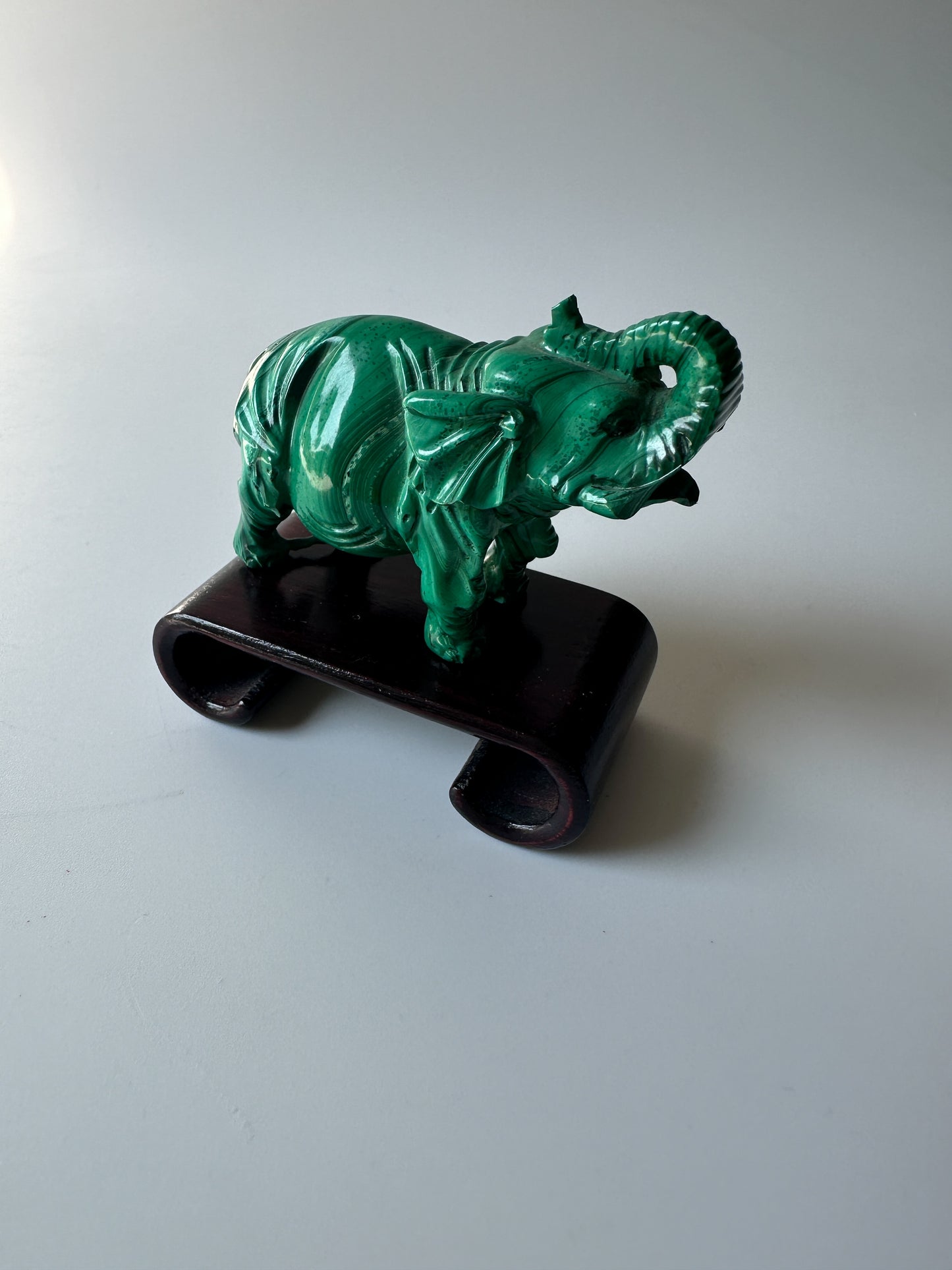 Genuine Malachite Elephant with Wood Stand (2.3125"L x 1"W x 1.75"H)