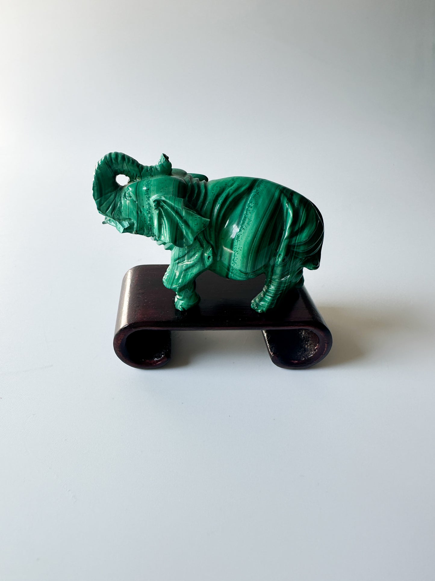 Genuine Malachite Elephant with Wood Stand (2.3125"L x 1"W x 1.75"H)