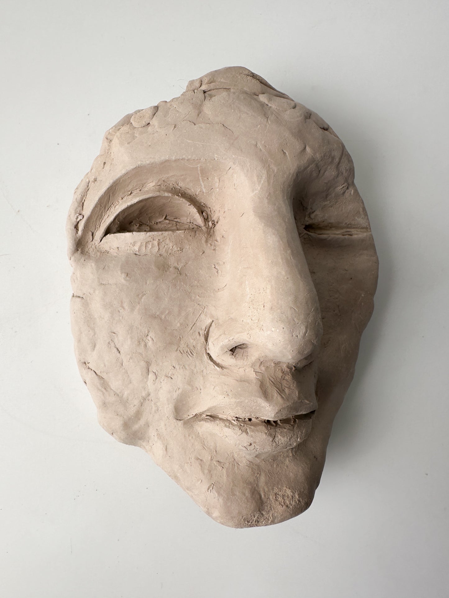 Clay Face Sculpture