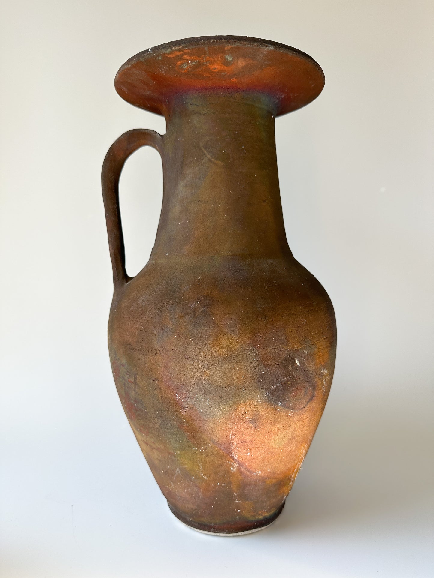 Large Rust Colored Raku Vessel with Handle (signed)