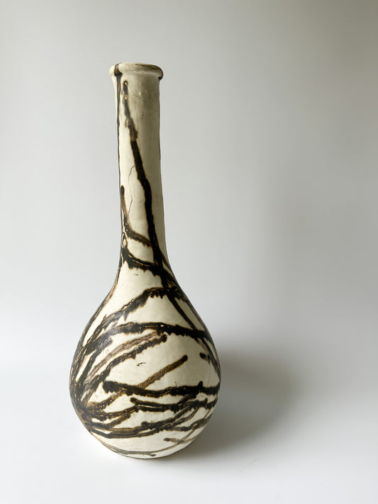 Tall Cream and Black Pottery Vessel